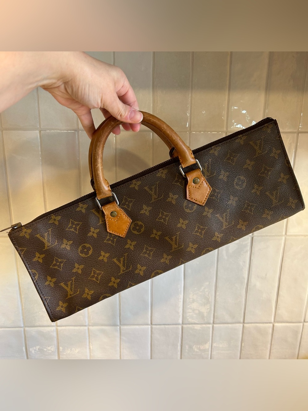 Louis Vuitton Monogram Sac Triangle Handbag